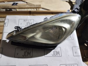 Фара левая HONDA FIT